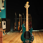 Lade das Bild in den Galerie-Viewer, Ernie Ball Music Man Stingray Bass aus 1999 in Translucent Teal
