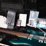 Load image into Gallery viewer, Music Man Luke III in Ocean Sparkle from 2021
